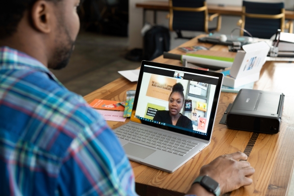 Entrepreneur on a Call with a Tech VA
